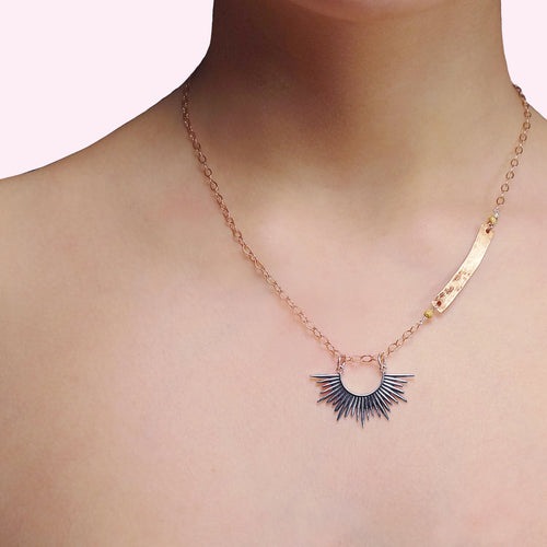 Starburst, darling: silver and hand hammered rose gold necklace