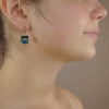 Peace and Harmony: peridot and Swiss blue topaz ear