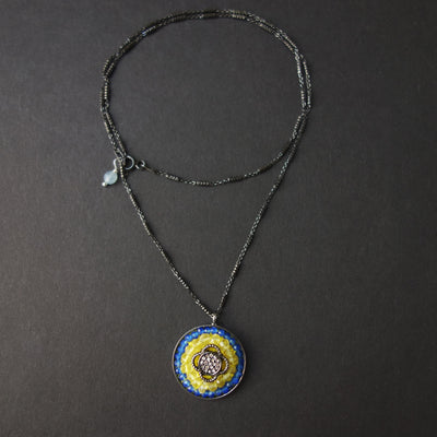 RAFFLE TICKET: diamond, topaz, and chalcedony necklace for the people of Ukraine