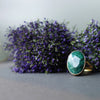 Faceted Emerald in Gold Ring