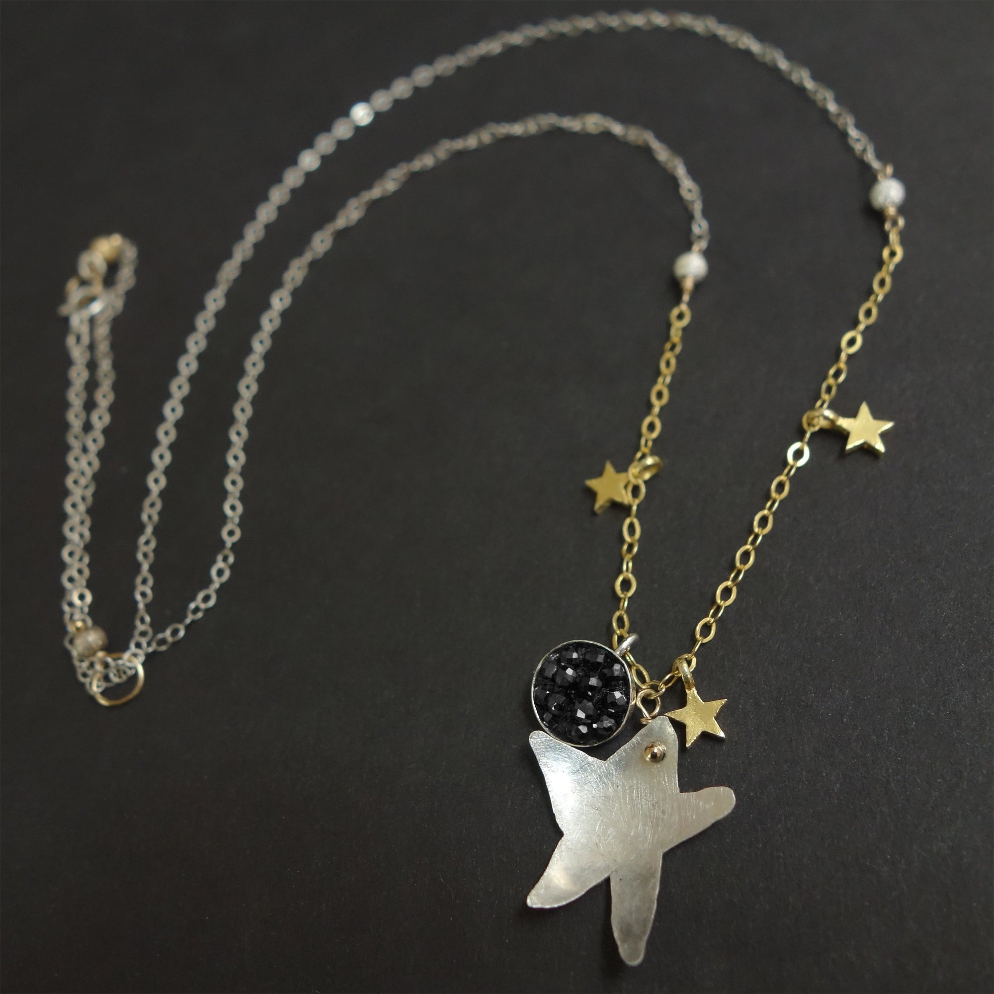 Good Morning, Starshine: hand hammered silver + black sapphire