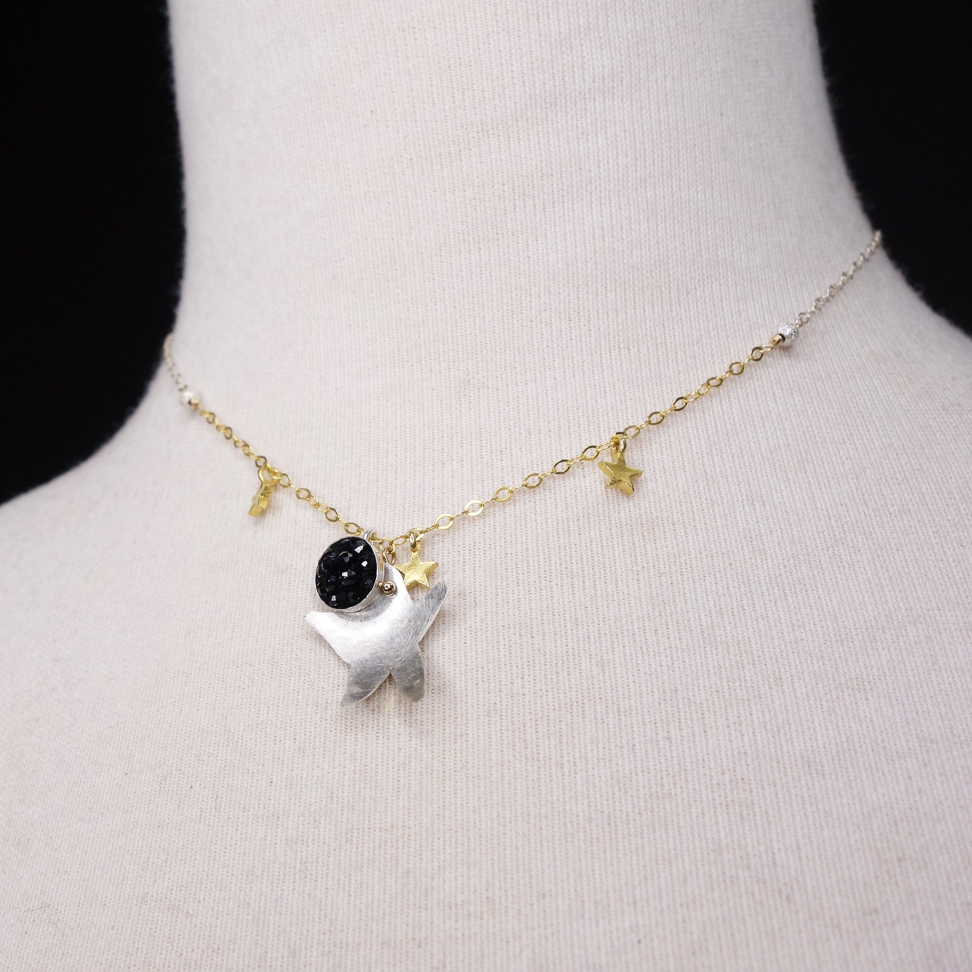 Good Morning, Starshine: hand hammered silver + black sapphire