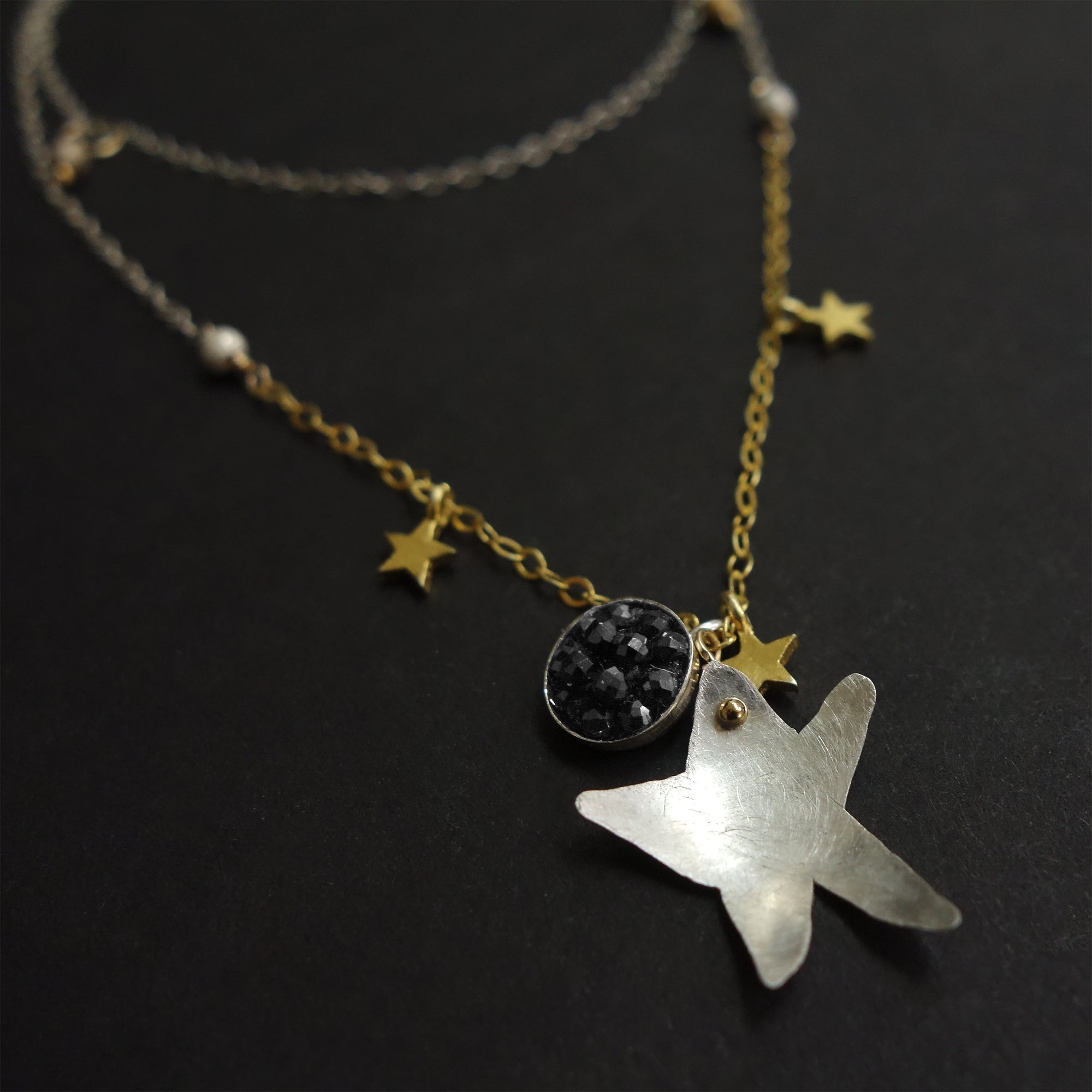 Good Morning, Starshine: hand hammered silver + black sapphire