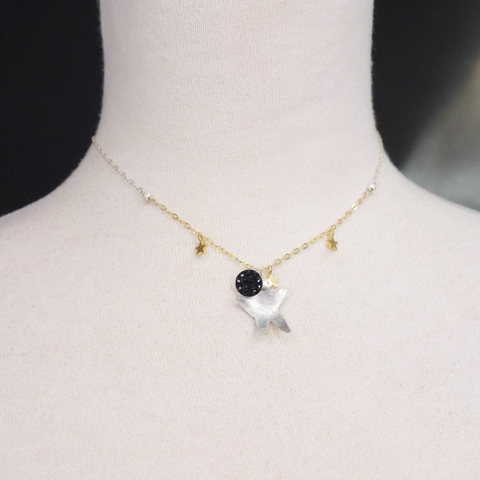 Good Morning, Starshine: hand hammered silver + black sapphire