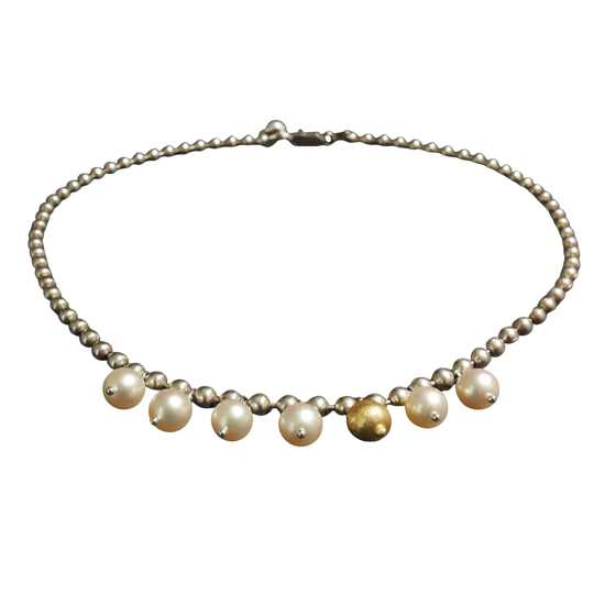 The Sun Pours Down Like Honey: pearl, gold, and silver necklace