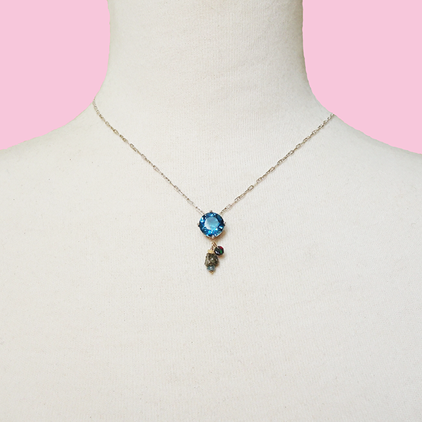 Brigid's Blessing: blue topaz, black opal, and raw pyrite