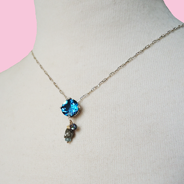 Brigid's Blessing: blue topaz, black opal, and raw pyrite