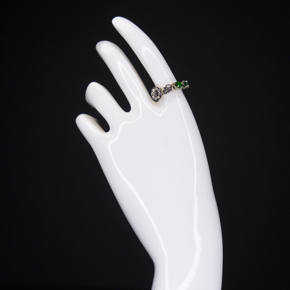 Diamond, emerald, and tourmaline ring