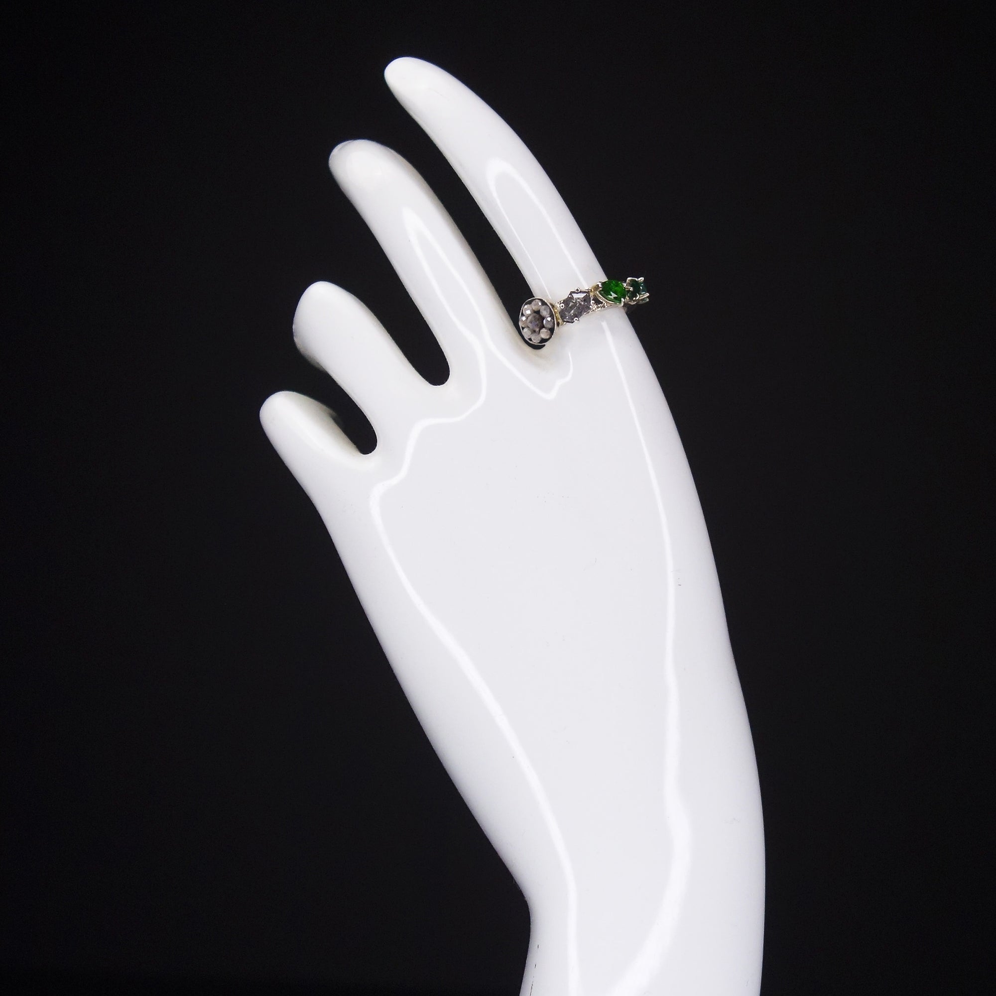 Diamond, emerald, and tourmaline ring