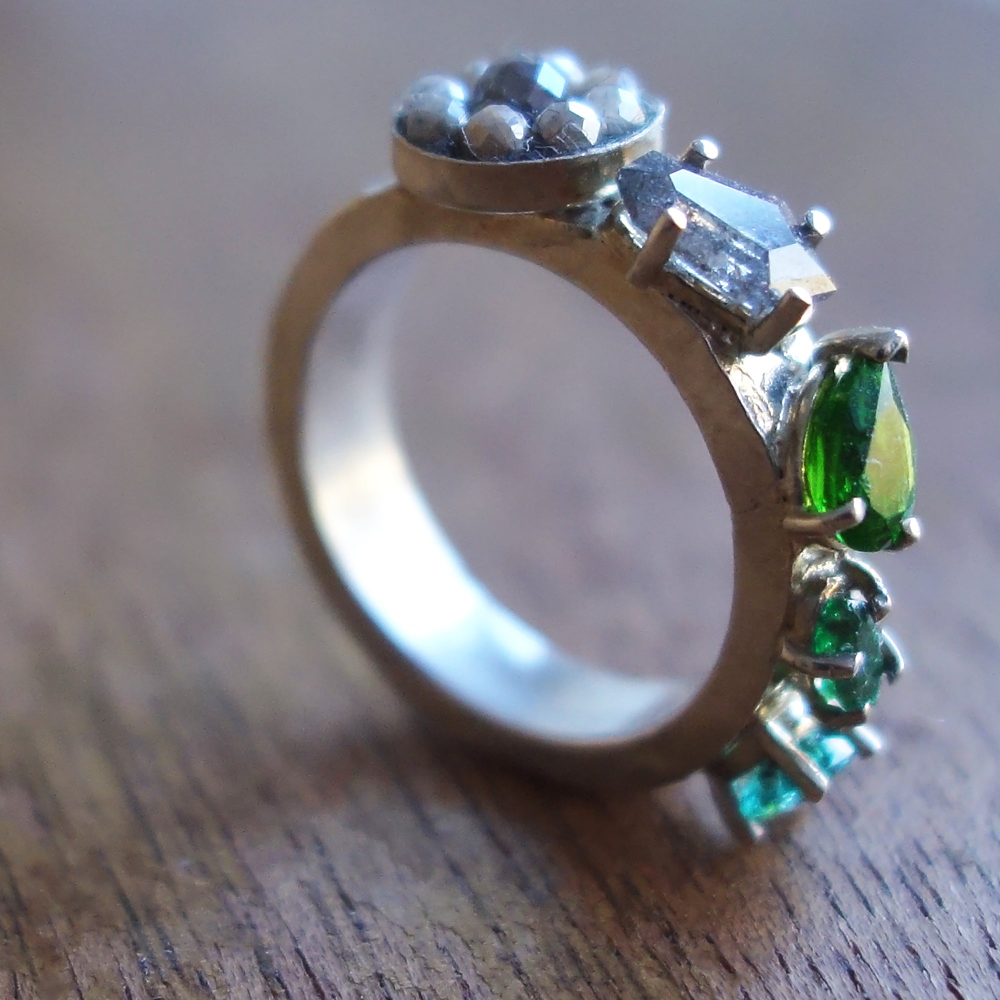 Diamond, emerald, and tourmaline ring