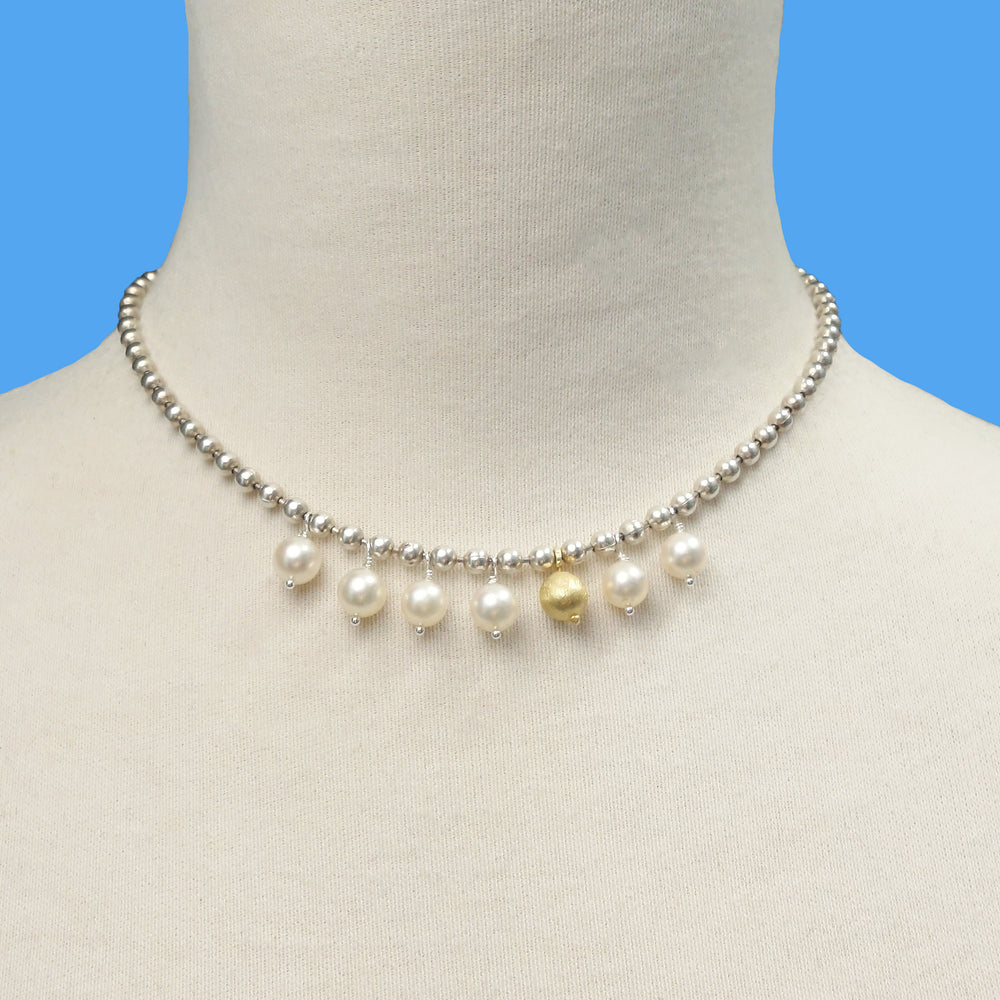 The Sun Pours Down Like Honey: pearl, gold, and silver necklace