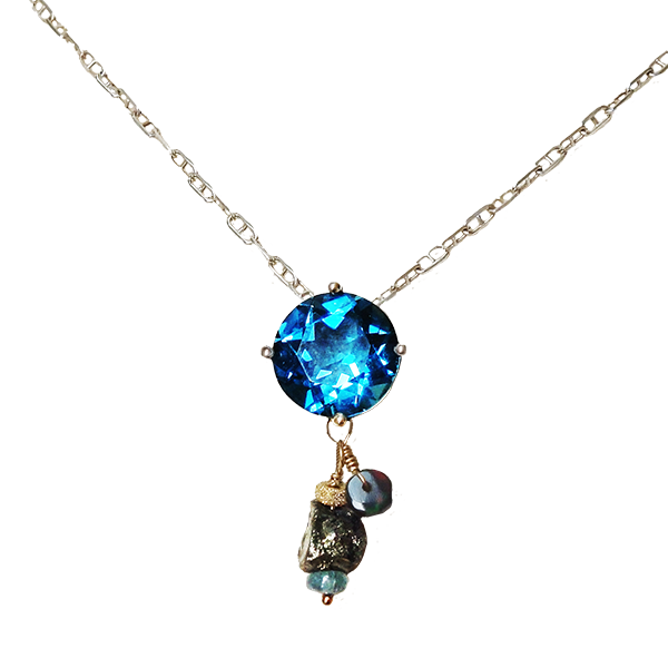 Brigid's Blessing: blue topaz, black opal, and raw pyrite