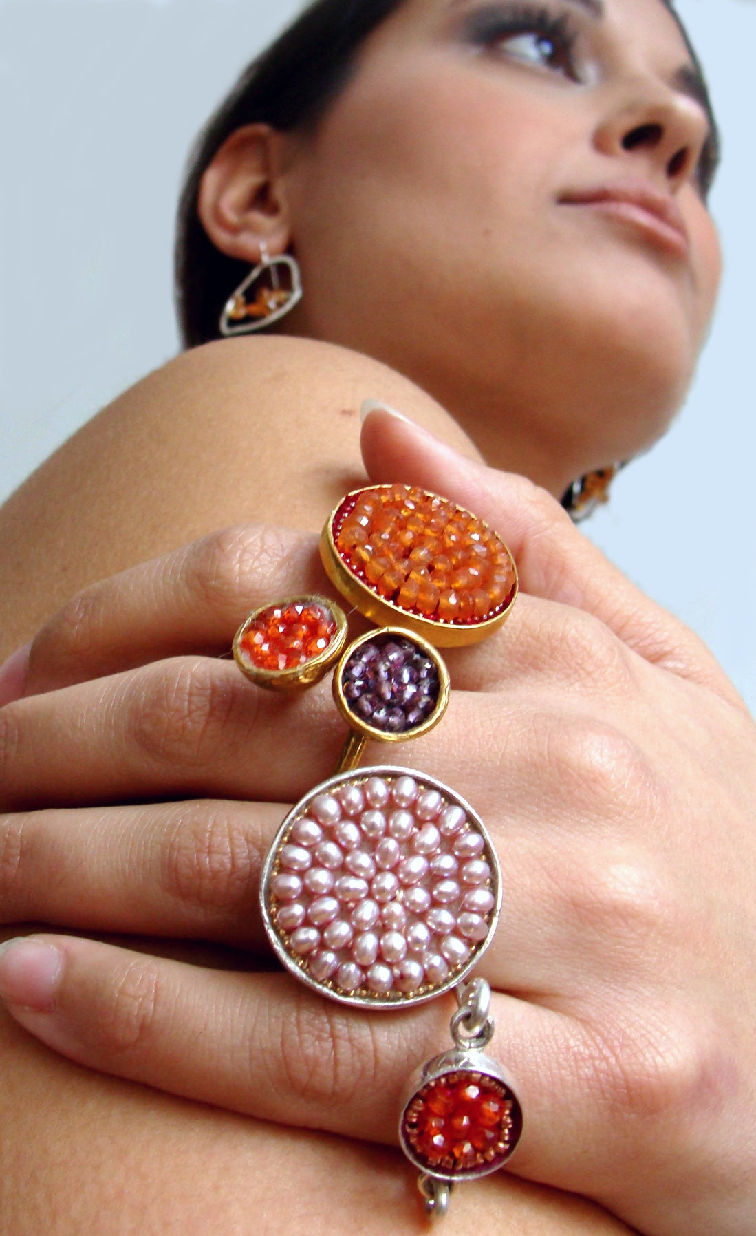 Faceted carnelian and gold mosaic ring