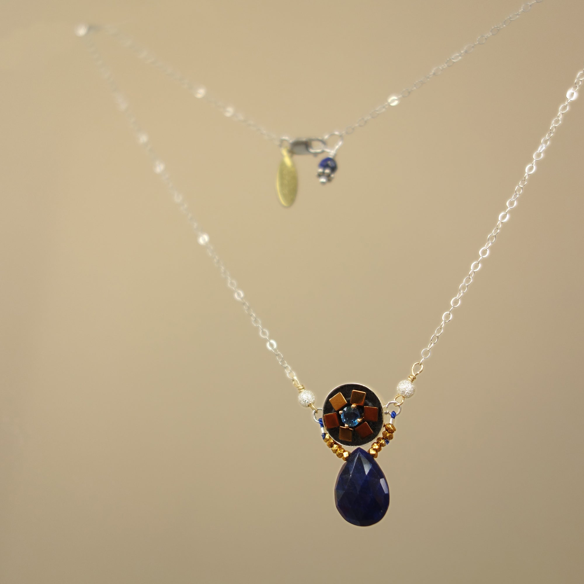 Alicia's heart of gold: blue sapphire mosaic necklace