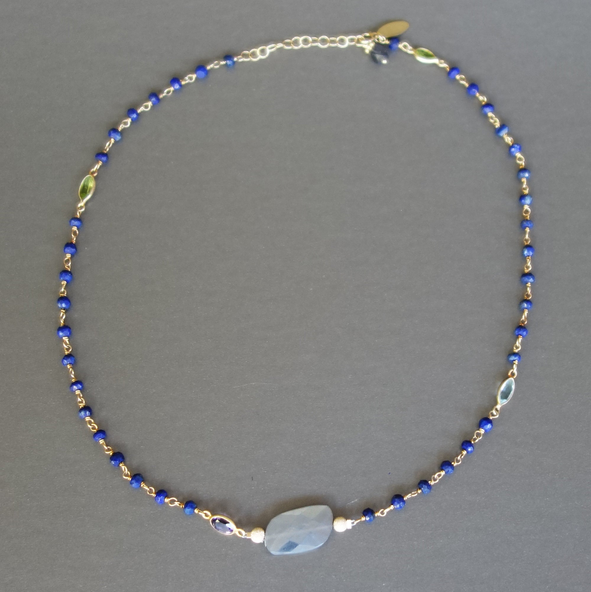 Gold, Silverite, and Blue Sapphire necklace
