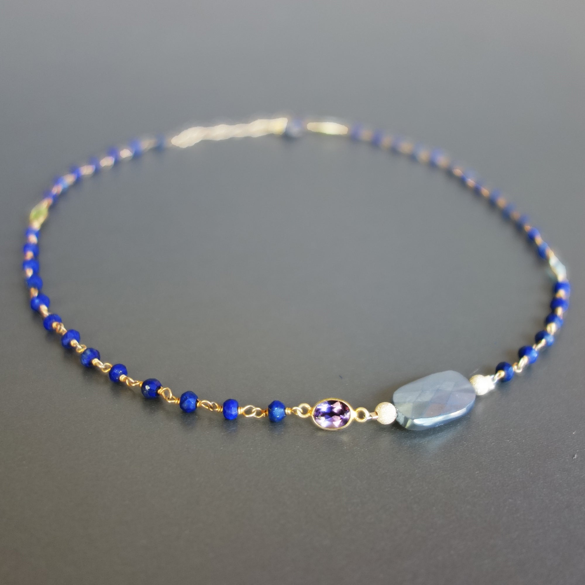 Gold, Silverite, and Blue Sapphire necklace