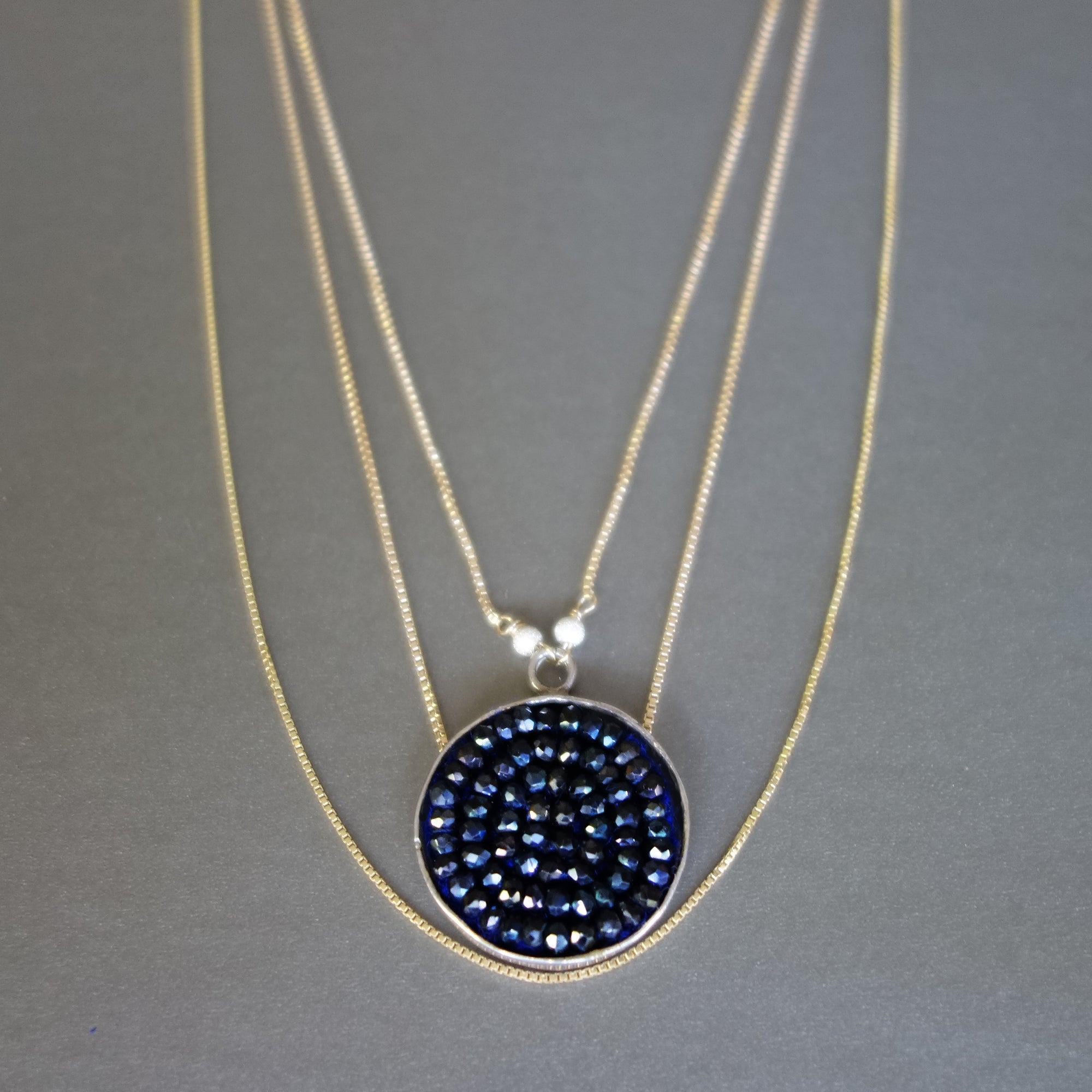 Triple Strand Gold and Blue Sapphire necklace