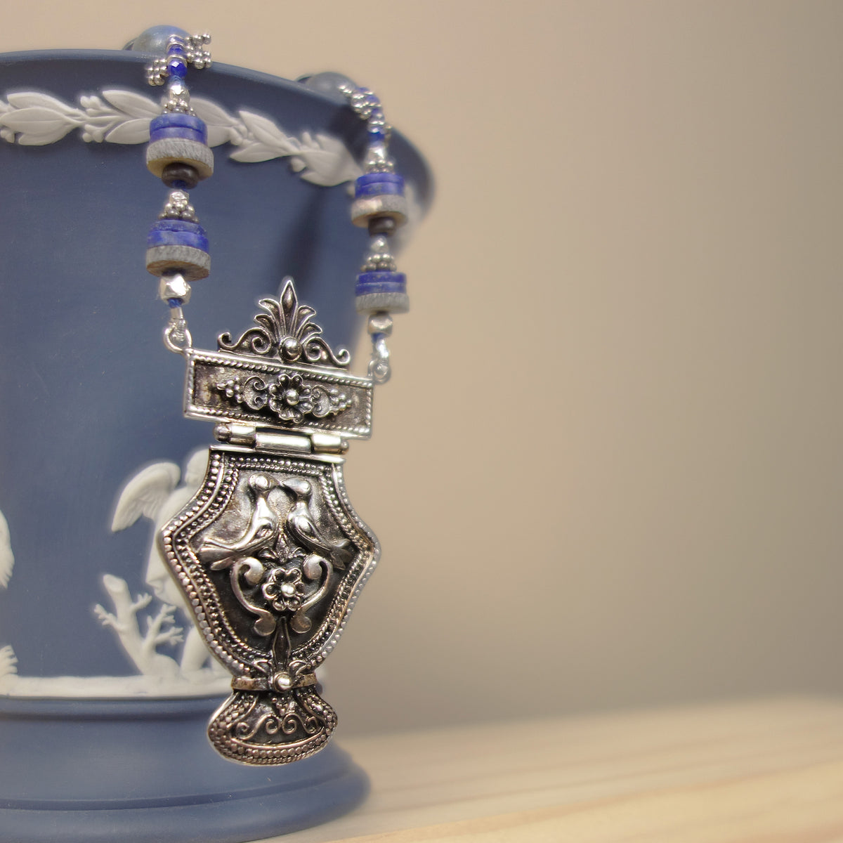 Lifegiving Lovebirds: handmade Greek silver and sapphire
