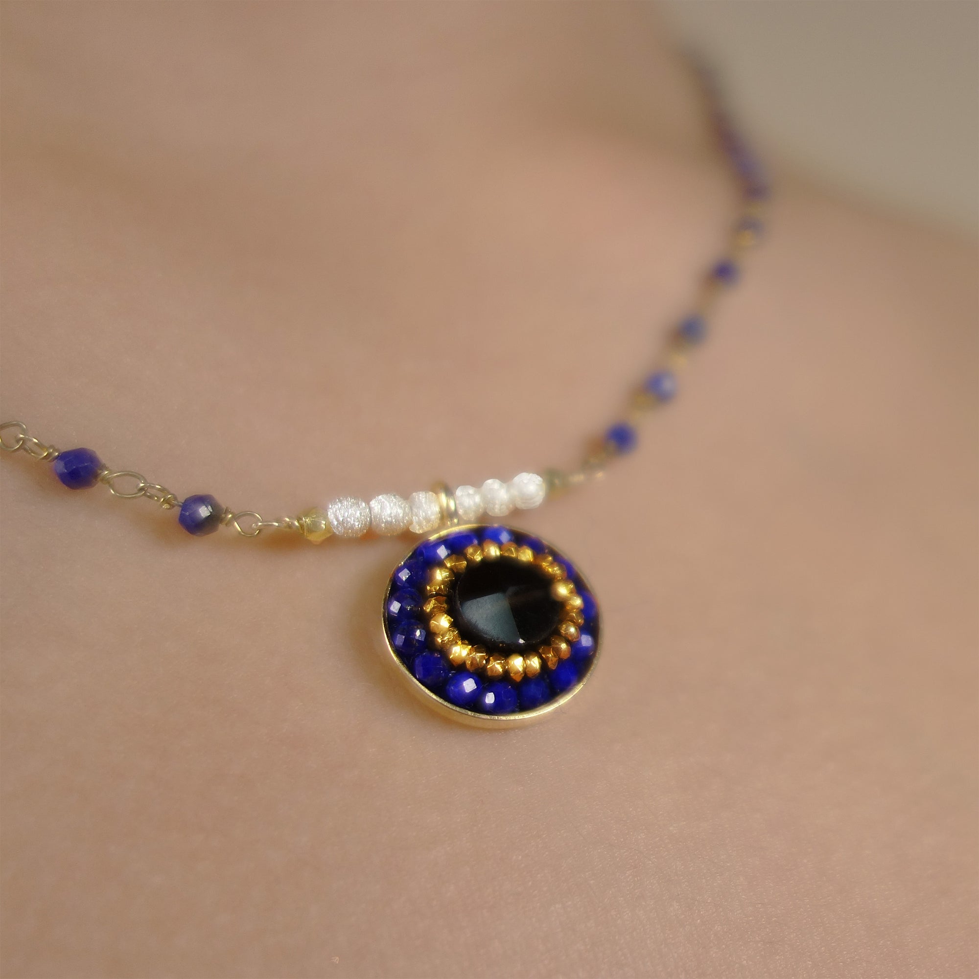 You're the One for Me: sapphire, topaz, and gold necklace