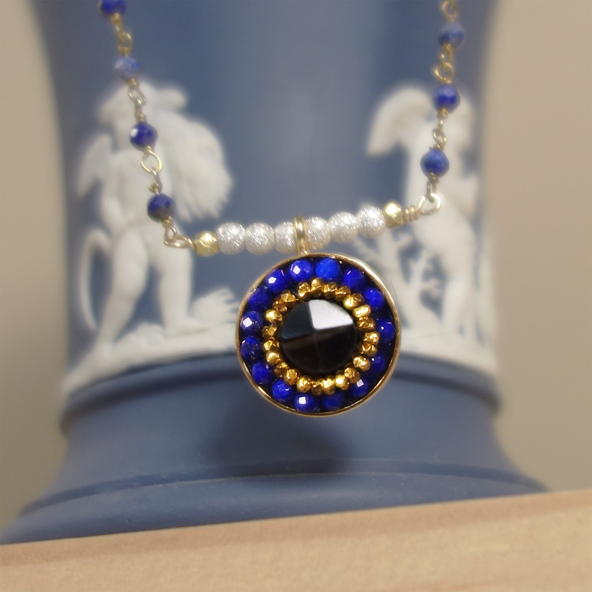 You're the One for Me: sapphire, topaz, and gold necklace