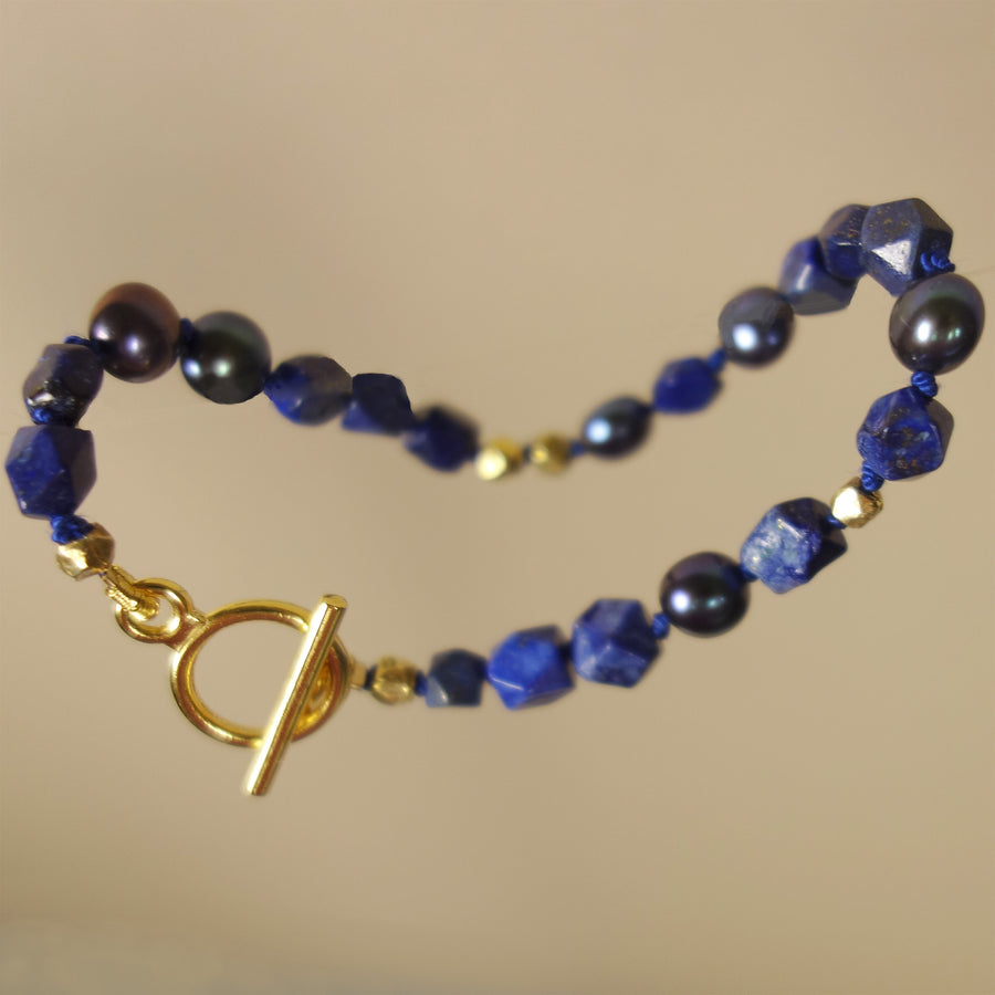 Joni Mitchell's blue bracelet: lapis, gold, pearls