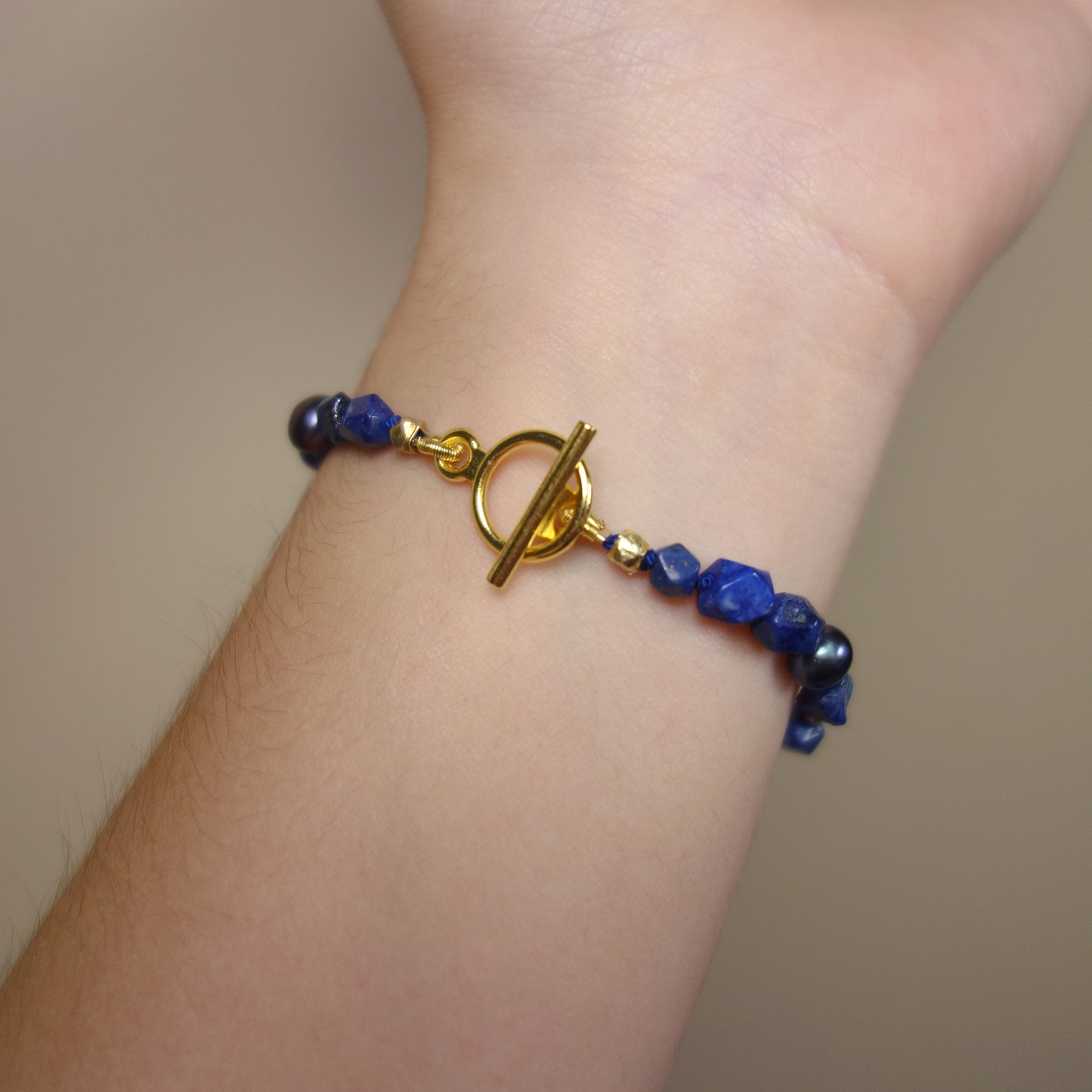 Joni Mitchell's blue bracelet: lapis, gold, pearls