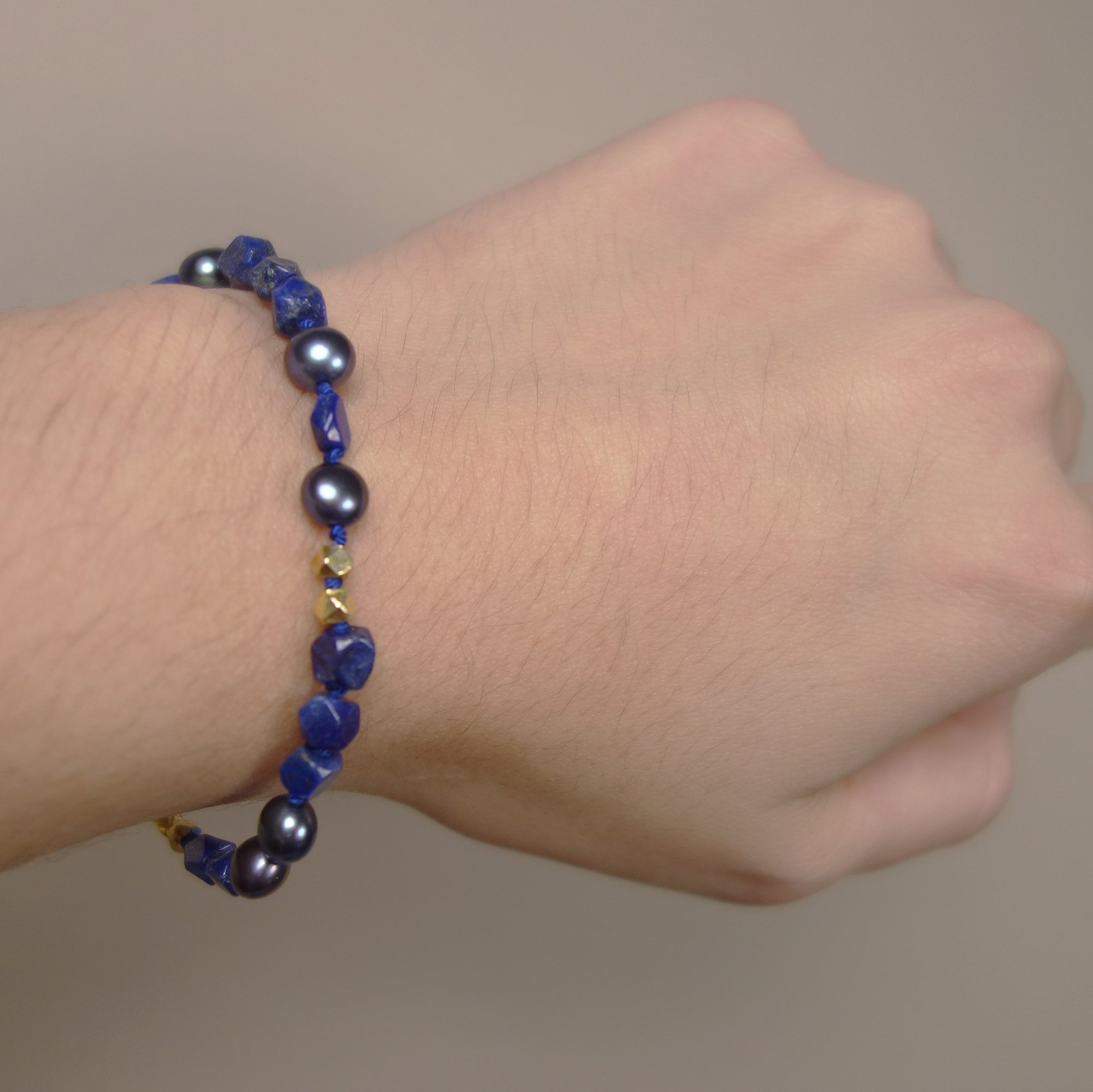 Joni Mitchell's blue bracelet: lapis, gold, pearls