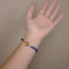 Joni Mitchell's blue bracelet: lapis, gold, pearls