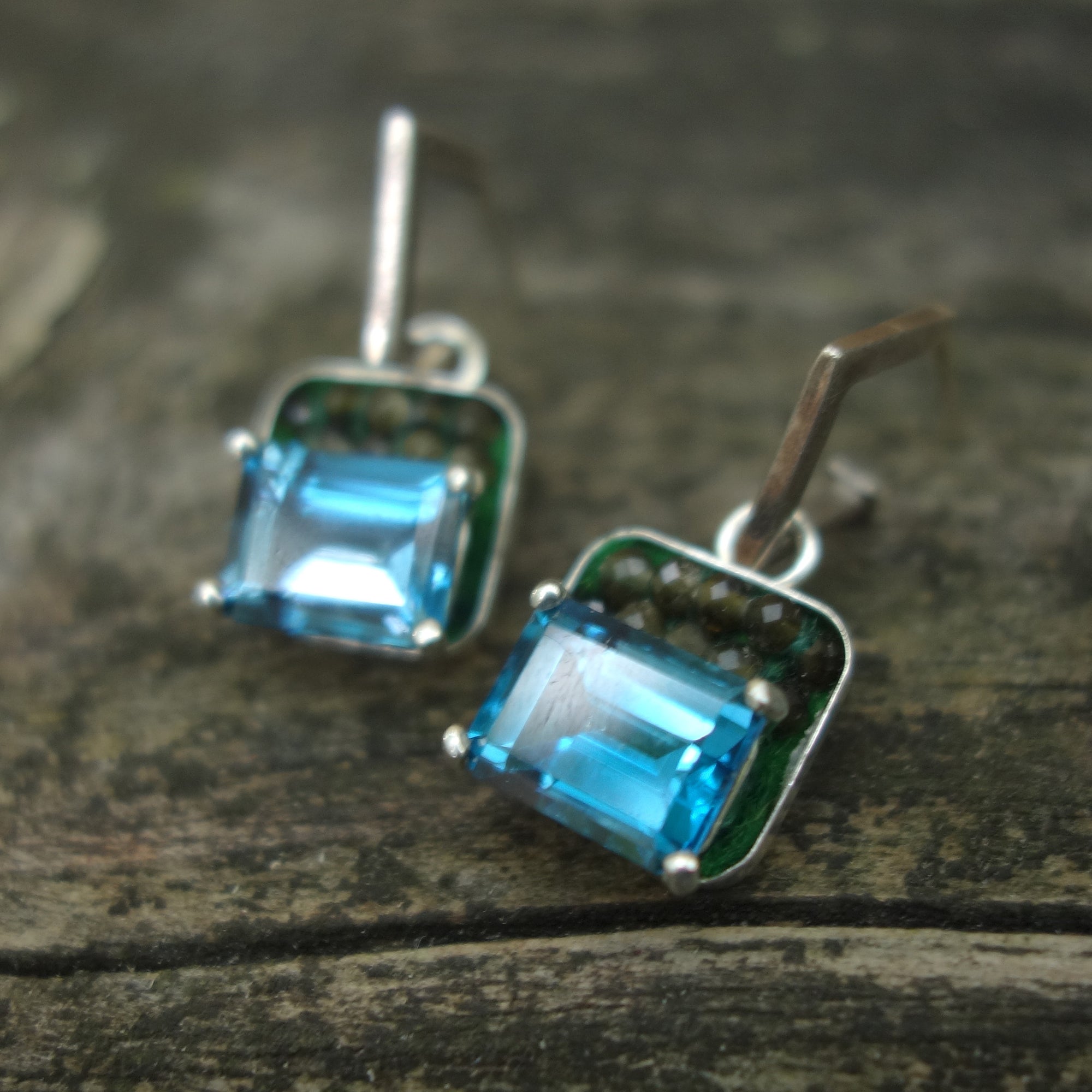 Peace and Harmony: peridot and Swiss blue topaz ear