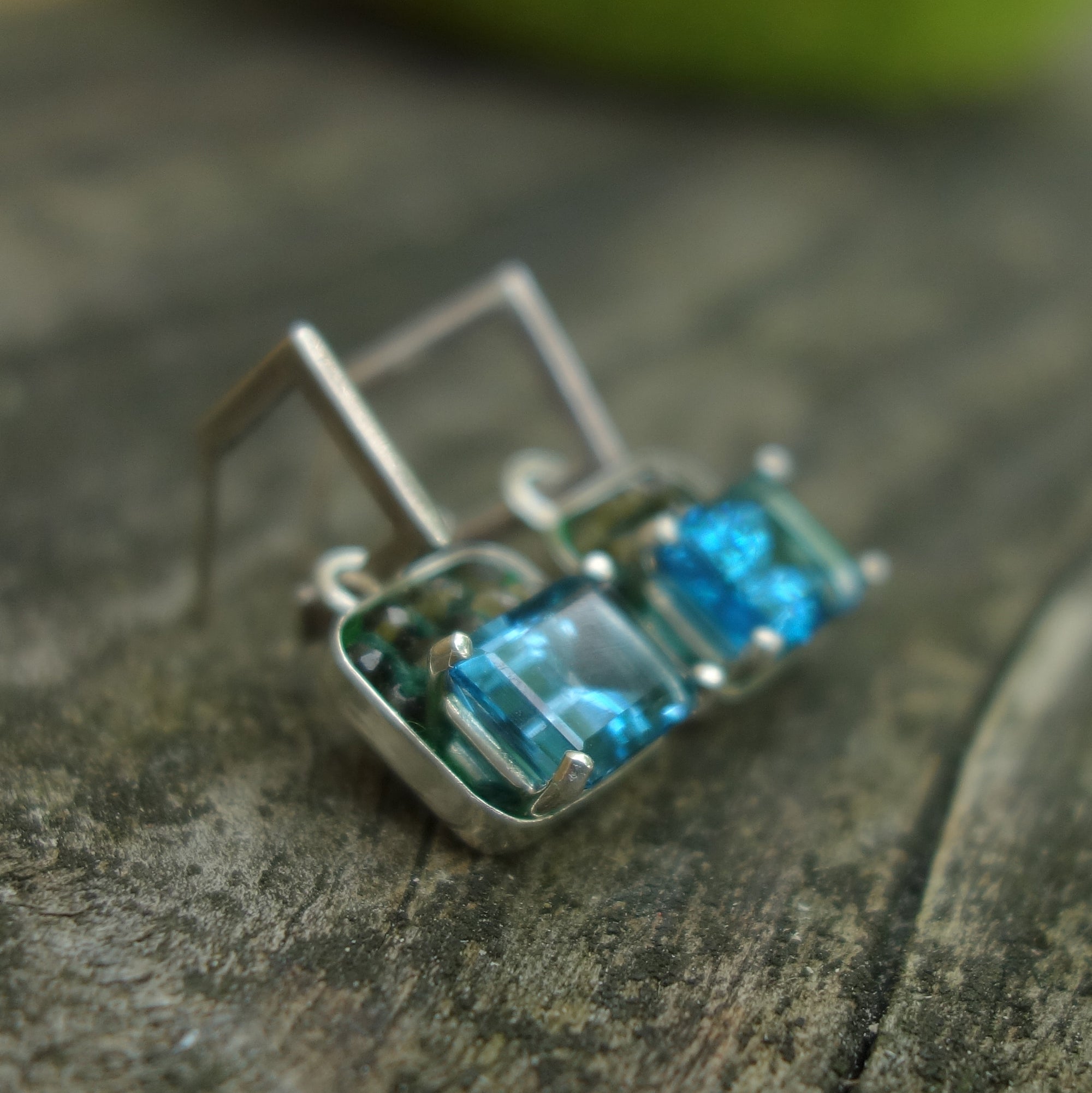 Peace and Harmony: peridot and Swiss blue topaz ear