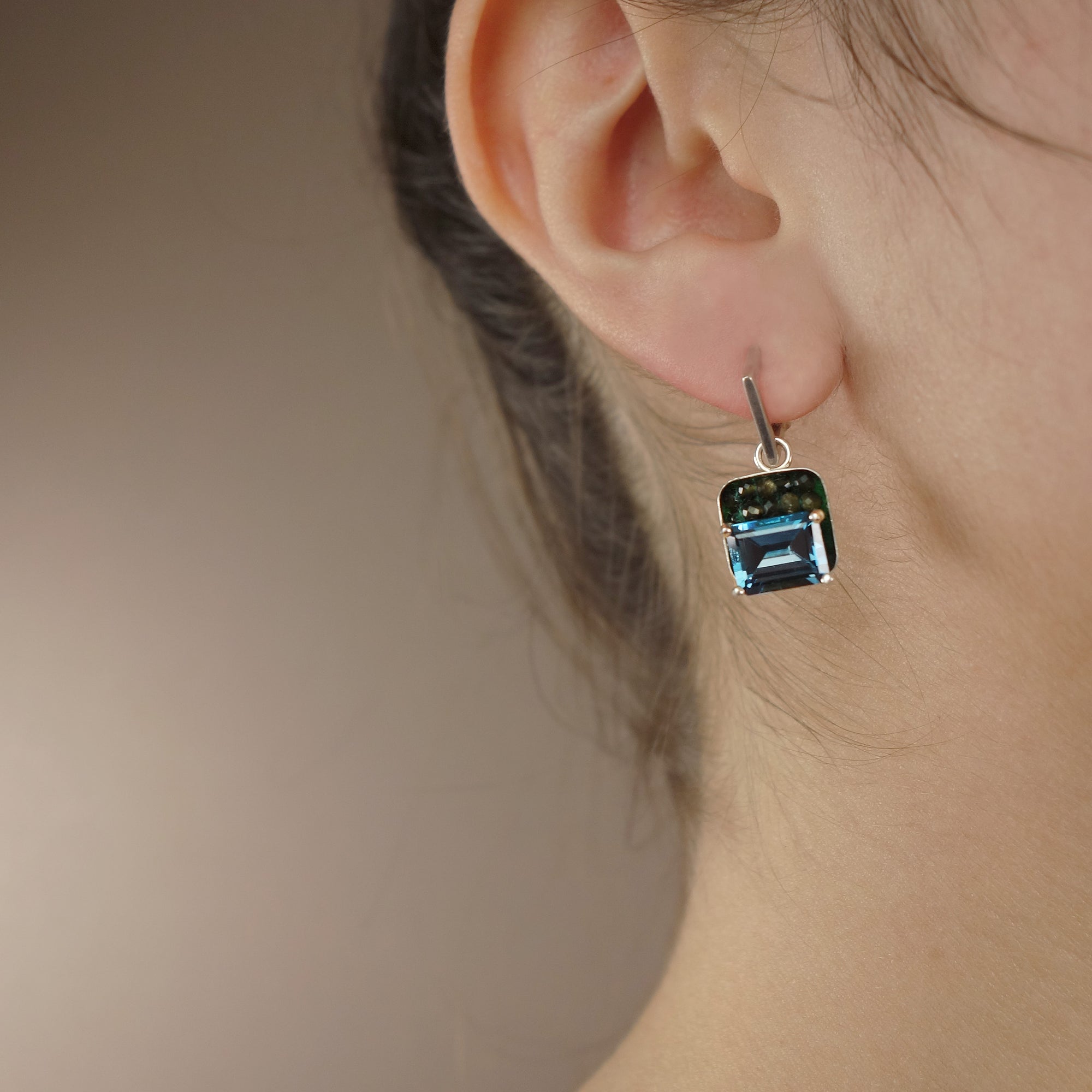 Peace and Harmony: peridot and Swiss blue topaz ear