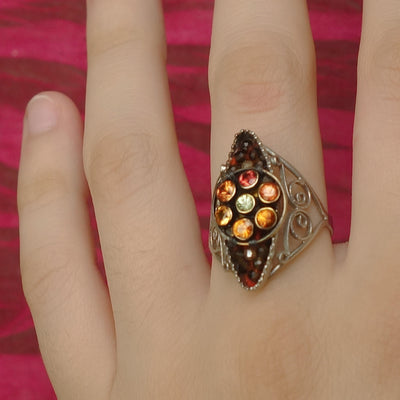 Tequila Sunrise ring: sapphire and andalusite