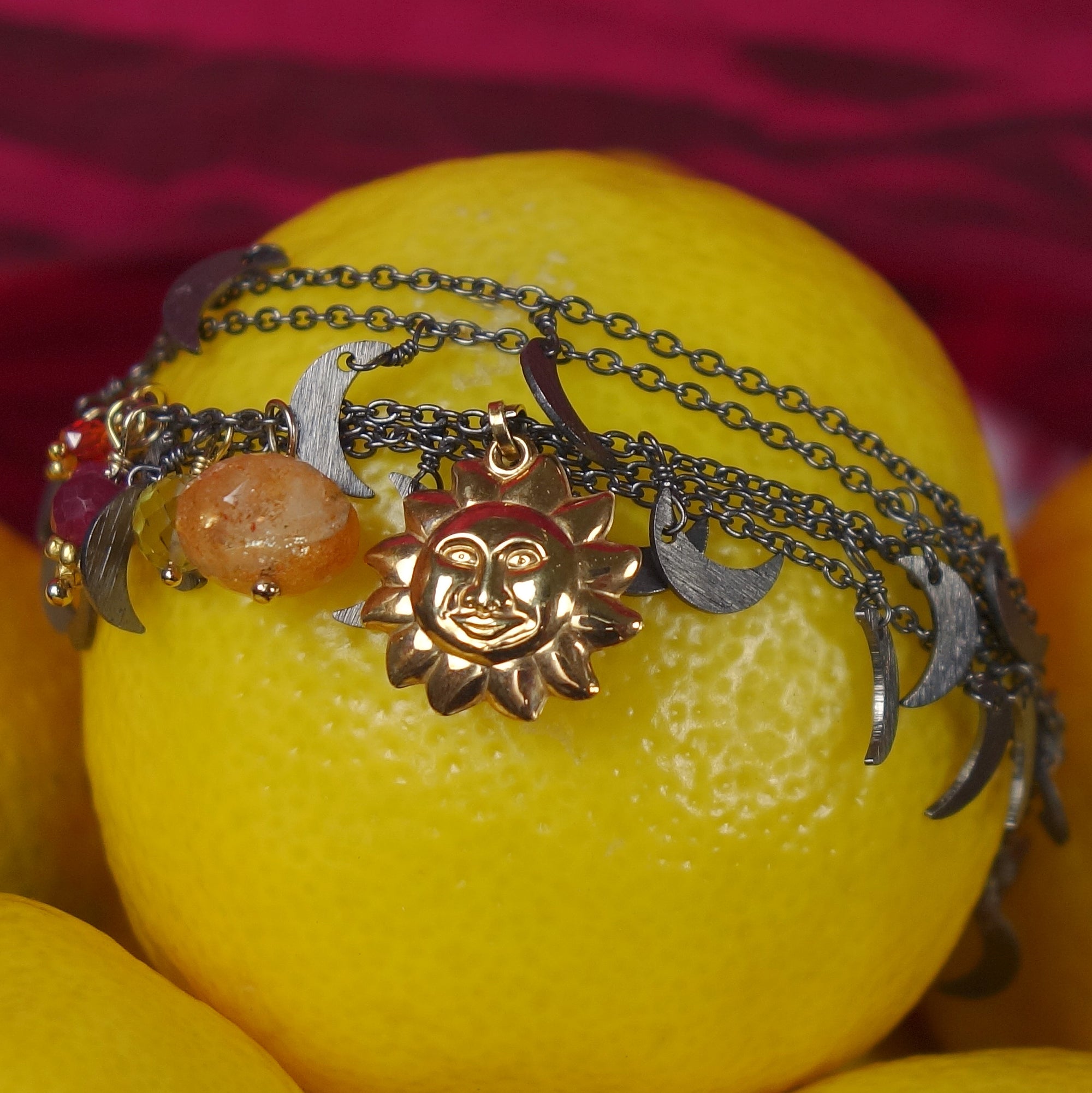 Here Comes the Sun gold, sunstone, ruby necklace