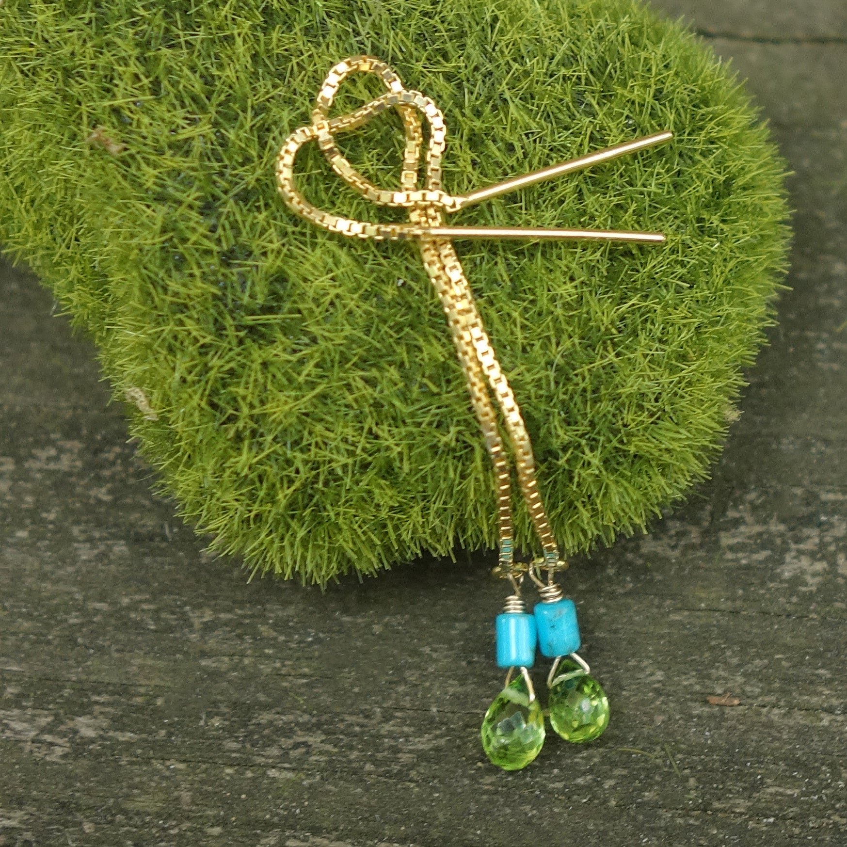 Katmandu: peridot and gold thread earring