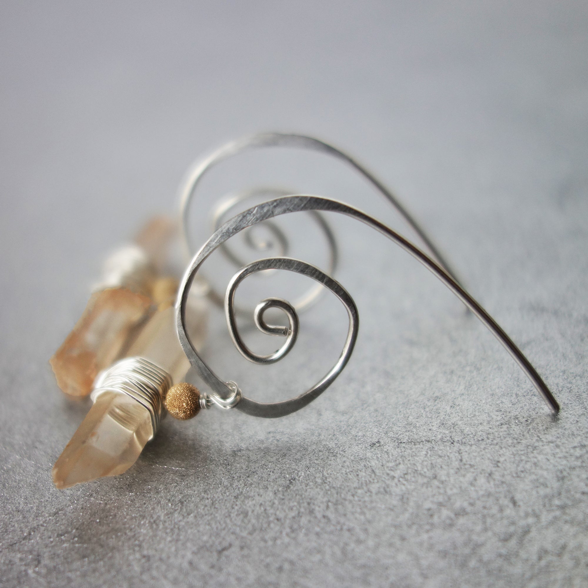 Natural Clear Quartz on Hand Hammered Silver earrings