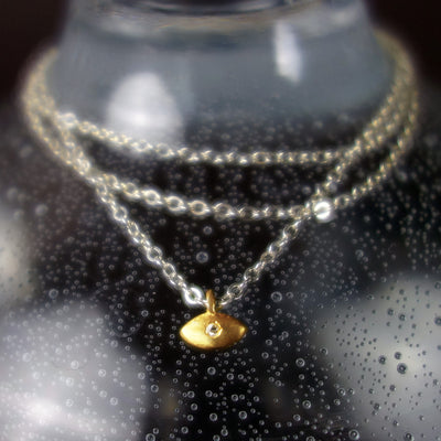 I Can See Clearly Now (diamond in golden eye necklace)