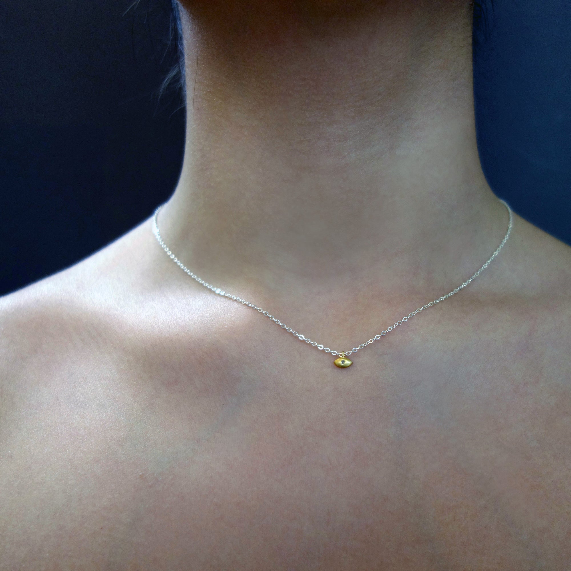 I Can See Clearly Now (diamond in golden eye necklace)