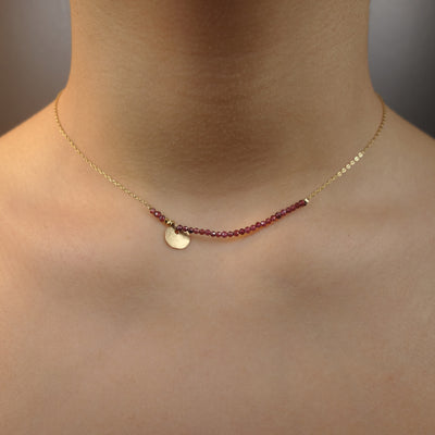 She Spoke Without Words (garnet and gold necklace)