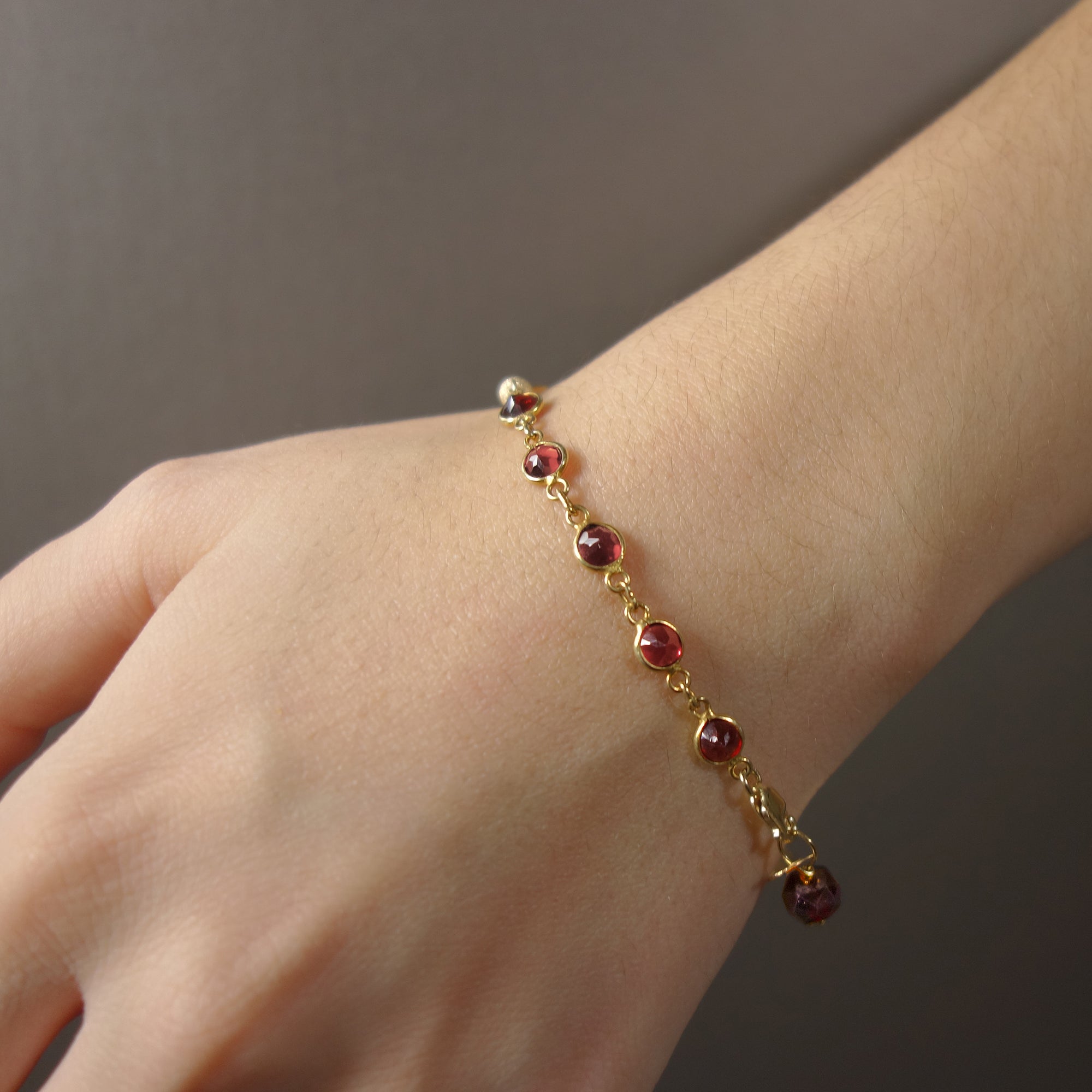 Mr. Darcy, I Presume (hand hammered gold, garnet bangle)