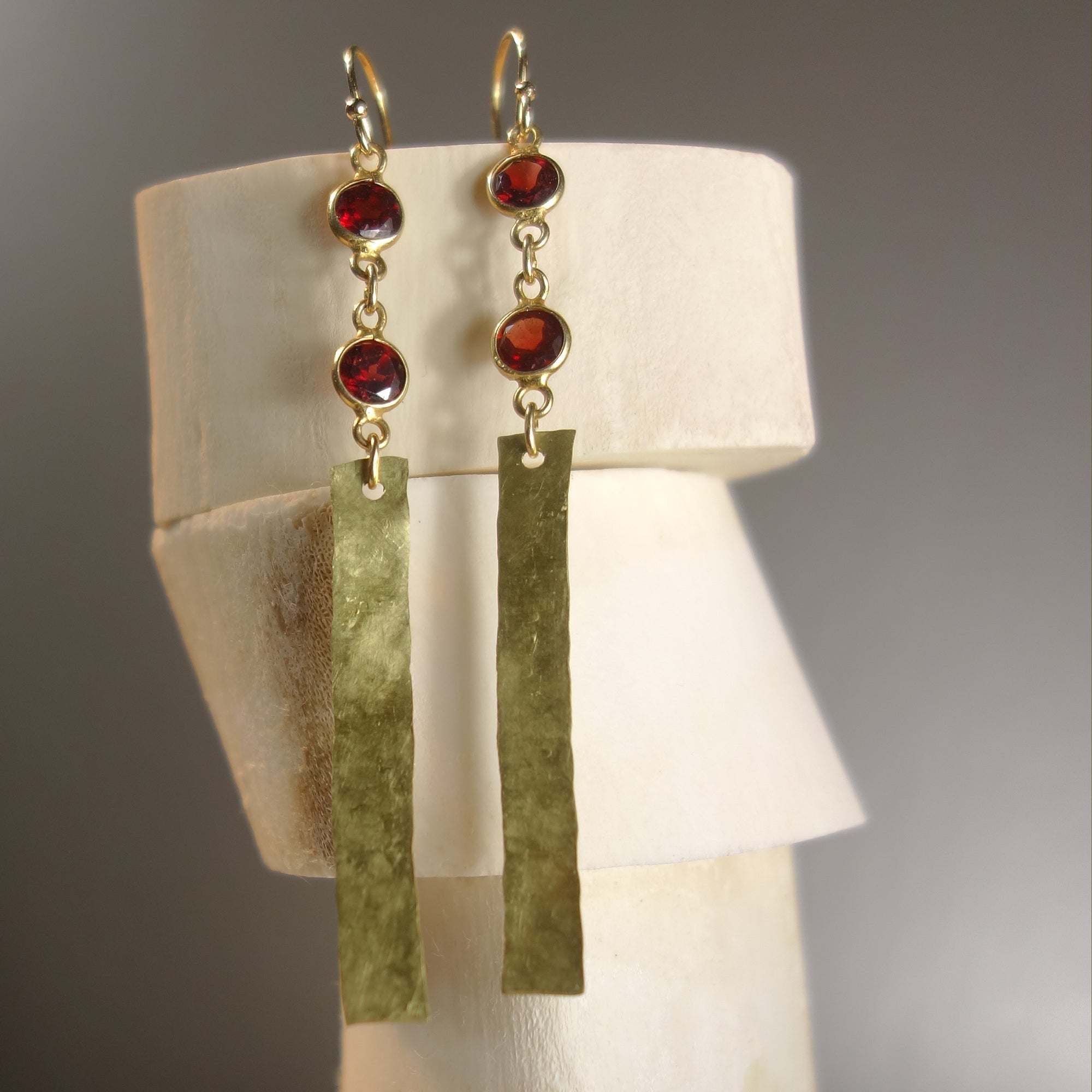 She Shines like Gold in the Sun (garnet, gold, and brass earring)