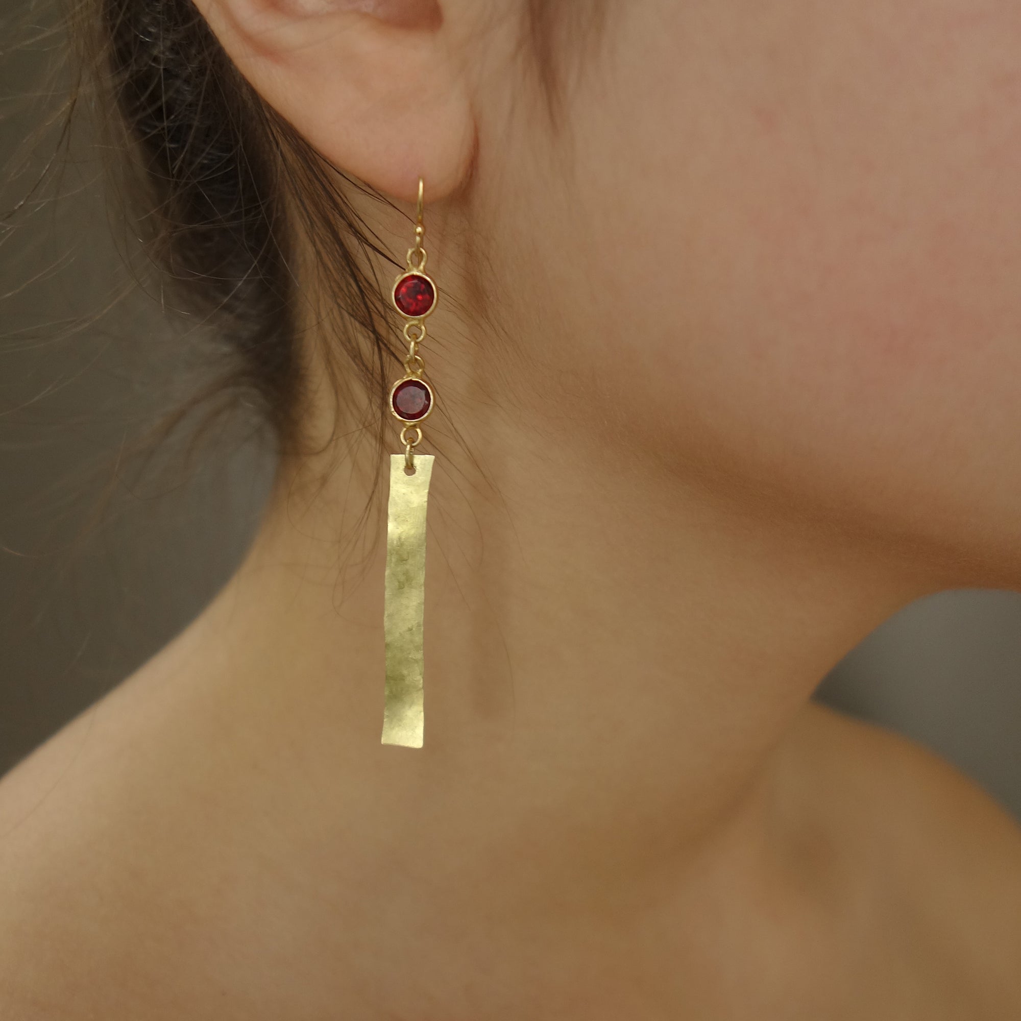 She Shines like Gold in the Sun (garnet, gold, and brass earring)