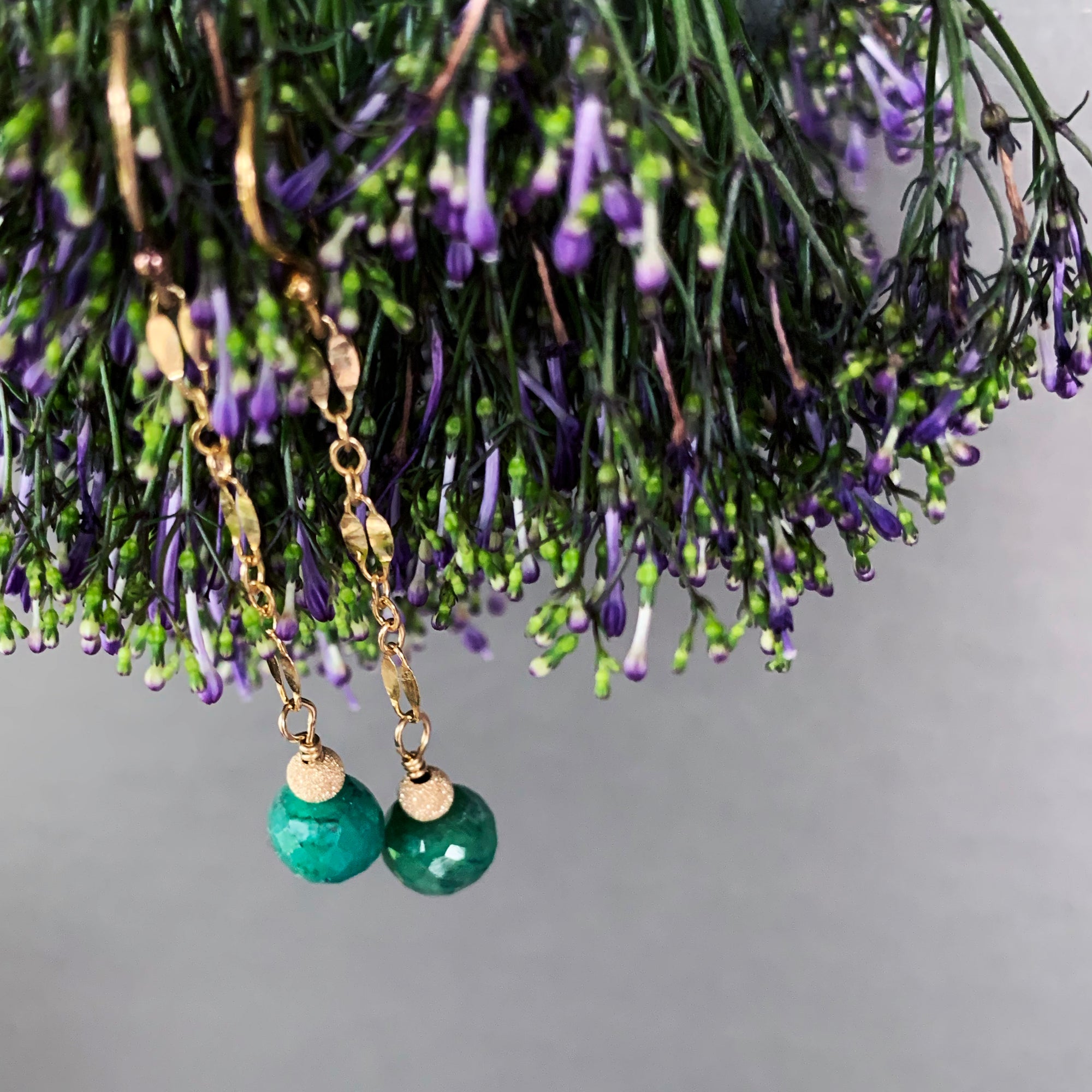 Faceted Emeralds Dancing on Gold Chain earrings