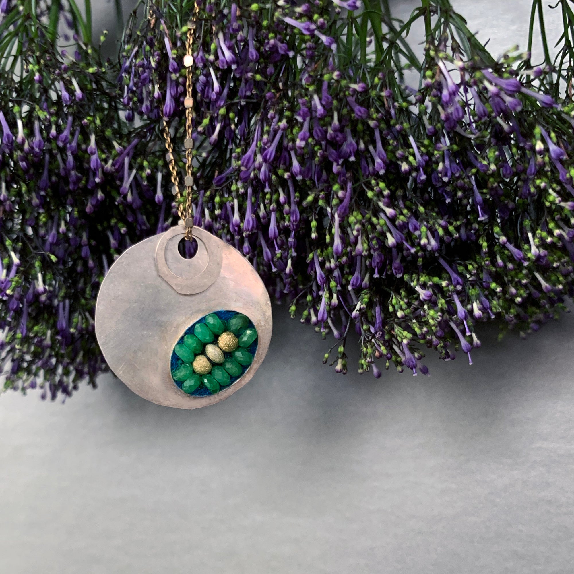 Emerald Mosaic on Hand Hammered Silver necklace