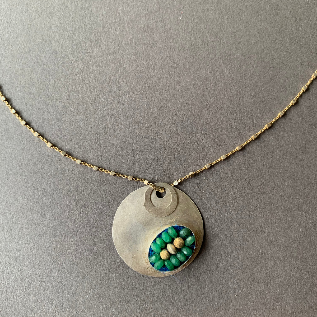 Emerald Mosaic on Hand Hammered Silver necklace