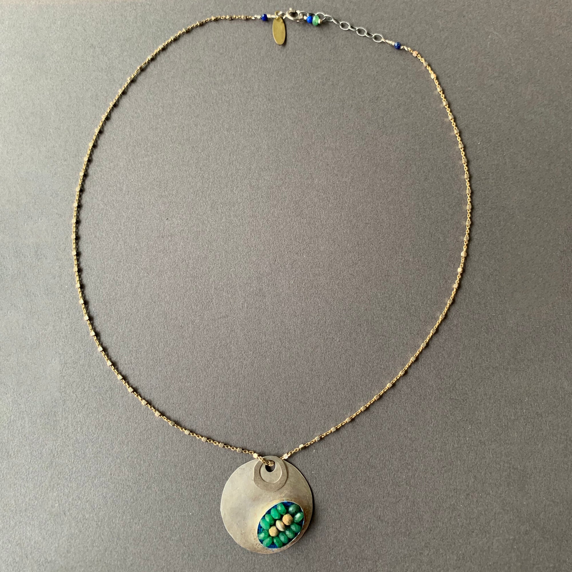 Emerald Mosaic on Hand Hammered Silver necklace