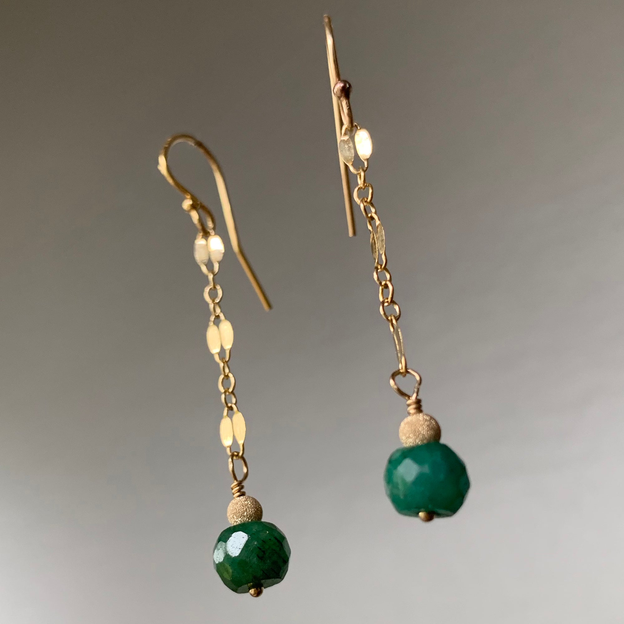 Faceted Emeralds Dancing on Gold Chain earrings