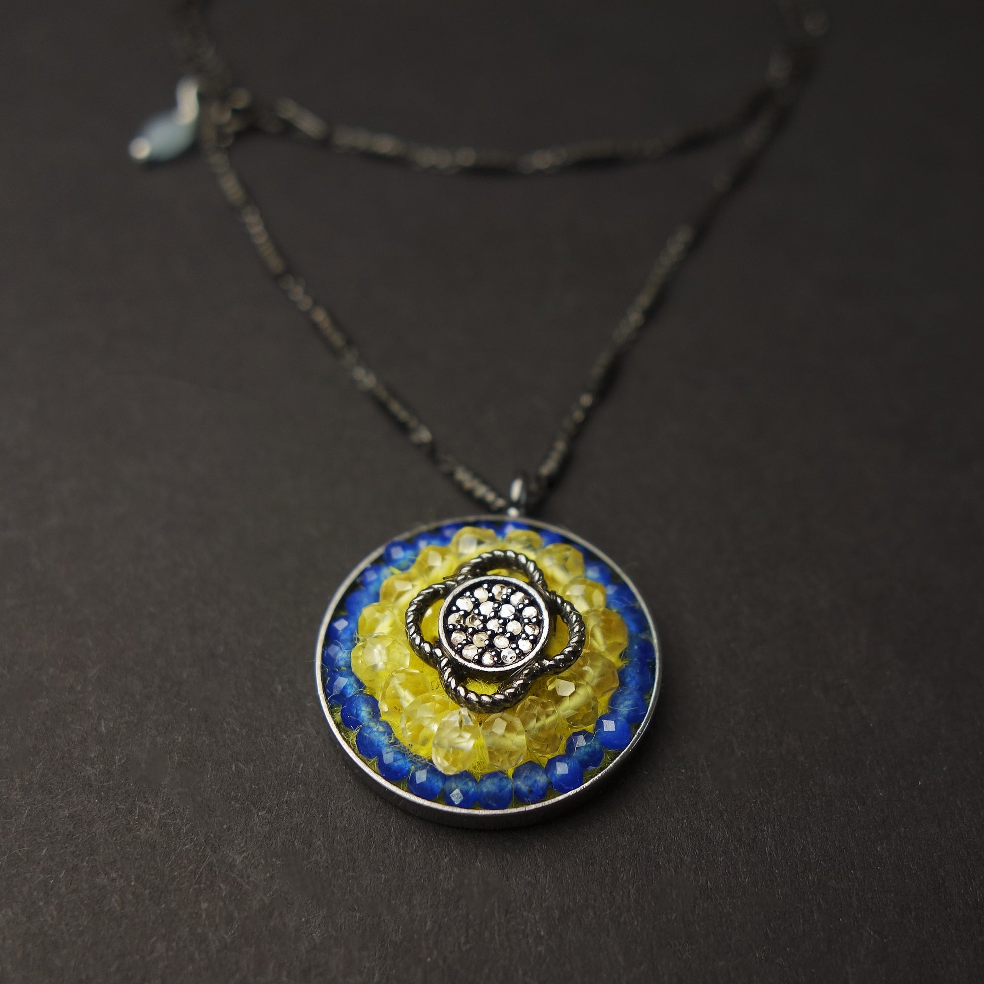 RAFFLE TICKET: diamond, topaz, and chalcedony necklace for the people of Ukraine