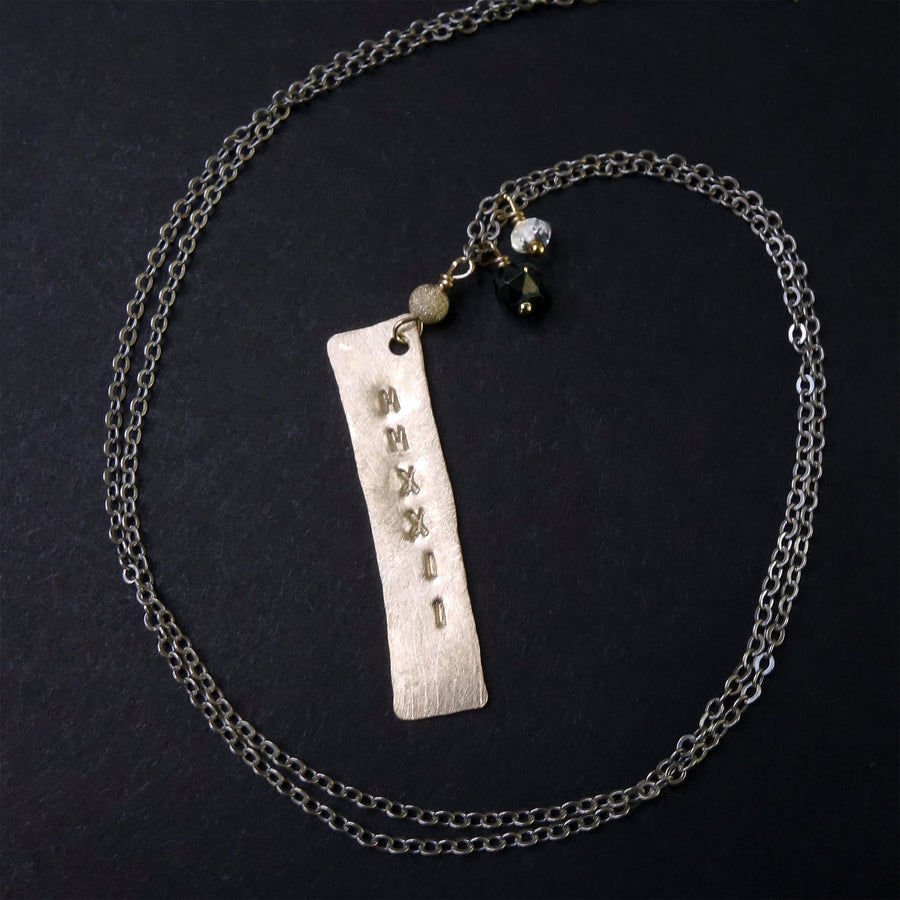 Hammered gold/silver MMXXII pendant with school colors