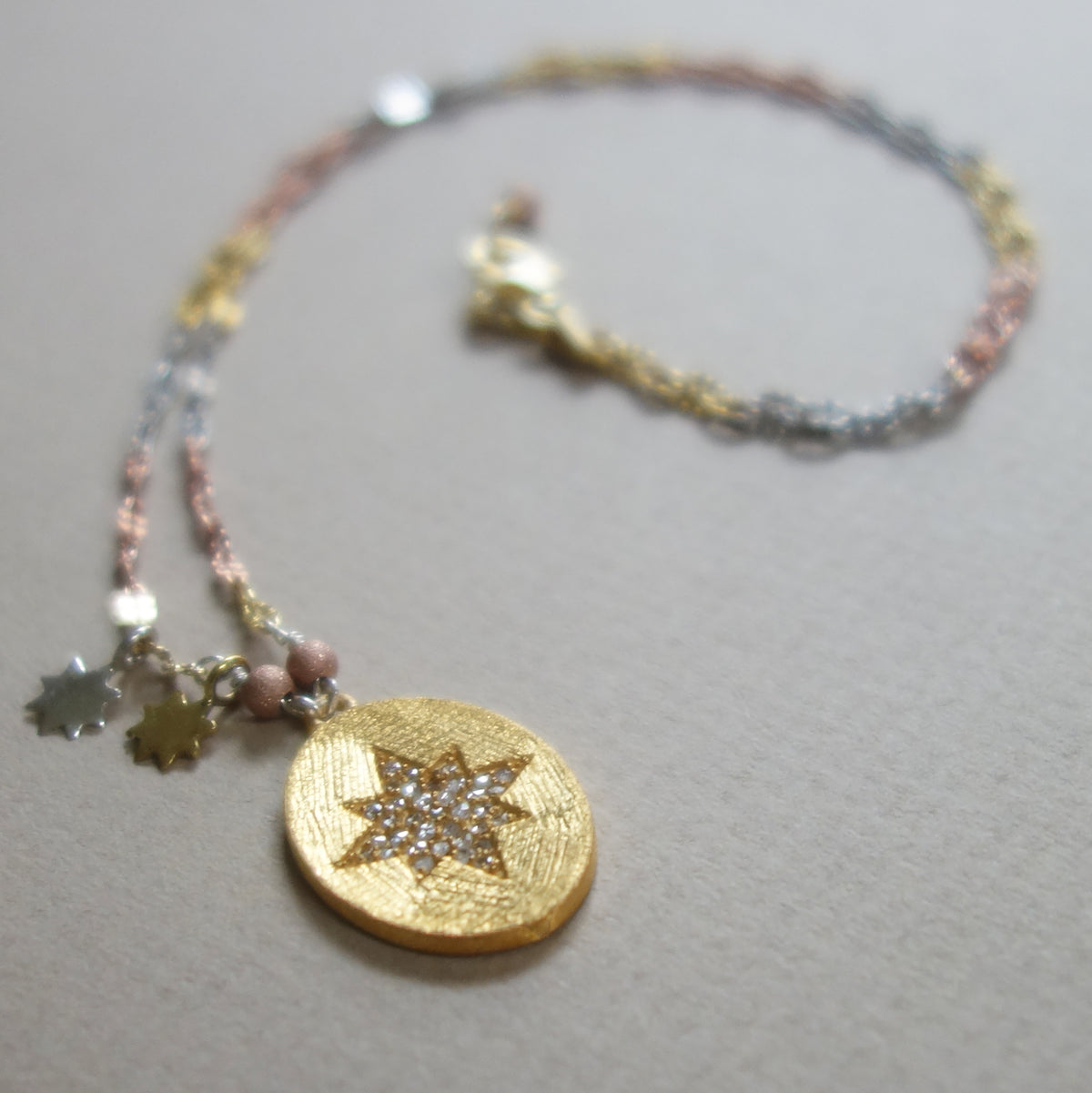 Diamonds in the Sun: brushed gold pendant necklace