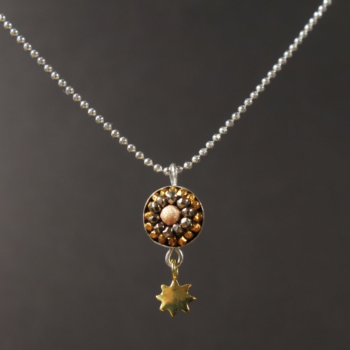 The Sun Also Rises: tiny mosaic/sun pendant necklace